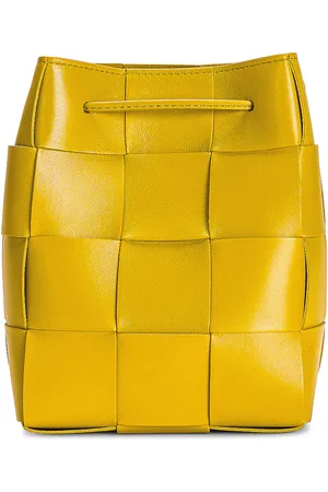 Bottega Veneta Small Cassette Bucket Bag in Pollen & Gold - Yellow. Size all.