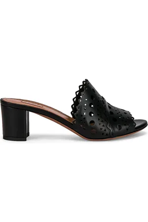Alaïa Vienne Mules in Noir - Black. Size 36 (also in 36.5, 37, 37.5, 38).