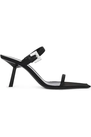 Saint Laurent Hope Mule Sandal in Noir - Black. Size 36 (also in 36.5, 37, 37.5, 38, 38.5, 39, 39.5, 40, 41).
