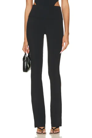 alo Airbrush High Waisted Bootcut Legging in Black - Black. Size L (also in S, XS).