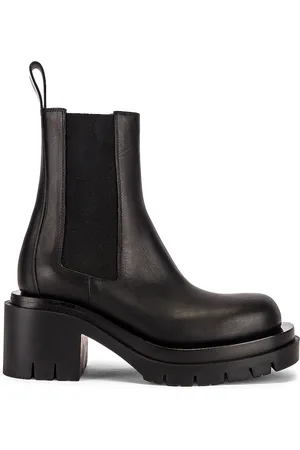 Bottega Veneta Lug Ankle Boots in Black - Black. Size 39 (also in 38, 38.5, 39.5, 40, 41).