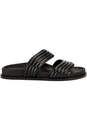 Alaïa Leather Slides in Noir - Black. Size 36 (also in ).