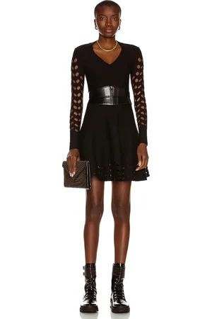 Alaïa Long Sleeve Mini Dress in Noir - Black. Size 42 (also in ).