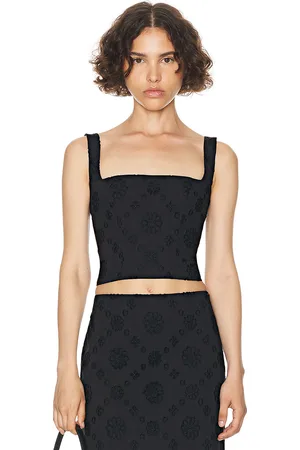 Helsa Eyelet Corset Top in Black - Black. Size M (also in L, S, XS).