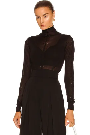Alaïa Long Sleeve Roll Neck Sweater in Noir - Black. Size 42 (also in ).