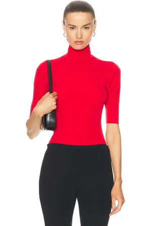 Norma Kamali Slim Fit Short Sleeve Turtleneck Top in Tiger Red - Red. Size L (also in XS).