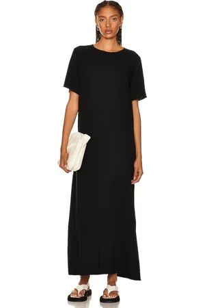 The Row Robi Dress in Black - Black. Size L (also in M, XL).