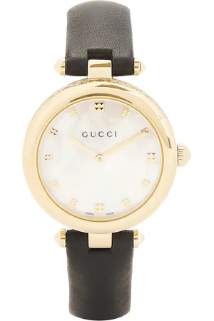 Gucci White Mother Of Pearl Dial Leather Strap Watch in Black - Black. Size all.