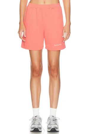 Sporty & Rich Serif Logo Soft Gym Short in Cotton Candy & White - Coral. Size XS (also in ).