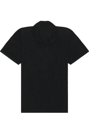 Issey Miyake Polo in Black - Black. Size 2 (also in 3, 4).