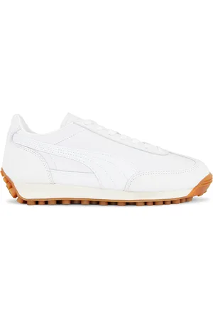PUMA Easy Rider Sneaker in Puma White & Frosted Ivory - White. Size 11 (also in 6, 9.5).