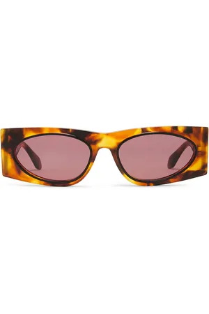 Alaïa Oval Transparent Sunglasses in Havana & Red - Brown. Size all.