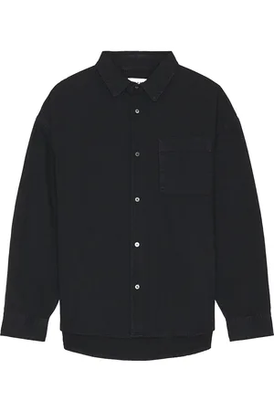 Frame Long Sleeve Relaxed Denim Shirt in Navy - Black. Size S (also in ).