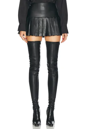 Norma Kamali Pleated Pickleball Skirt in Black - Black. Size L (also in M, S, XS).