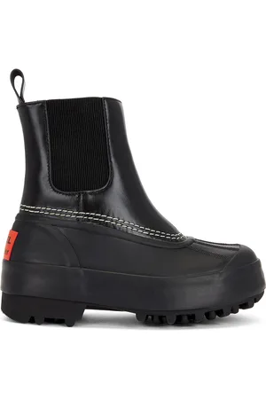 sorel X Proenza Schouler Caribou Chelsea Boot in Black - Black. Size 11 (also in 6, 8).