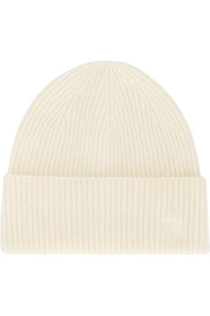 Totême Ribbed Wool Beanie in Snow - Ivory. Size all.
