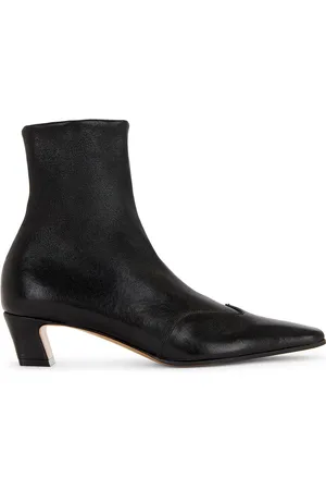 Khaite Nevada Ankle Stretch 40 Boot in Black - Black. Size 36 (also in ).