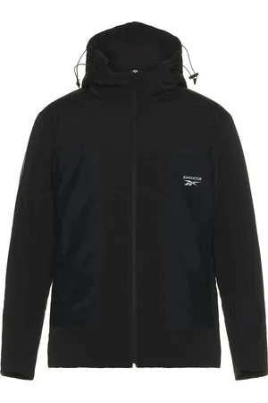 Reebok X Kanghyuk Stitched Logo Padded Jacket in Dark Grey - Black. Size L (also in M, S, XL).