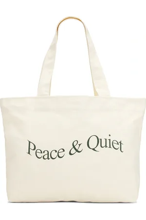 Museum of Peace and Quiet Wordmark Pigment Dyed Tote Bag in Bone - Cream. Size all.