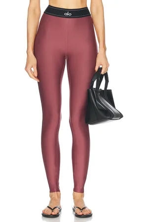 alo Airlift High Waist Suit Up Legging in Burgundy Truffle & Black - Burgundy. Size S (also in XS).