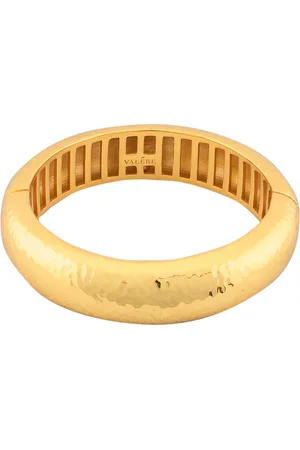 VALÉRE Domed Small Bangle Bracelet in Yellow Gold - Metallic Gold. Size all.