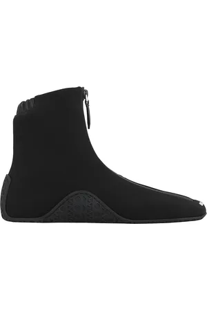 Alaïa Ankle Sneakers in Black - Black. Size 36 (also in 37, 38, 39, 40).