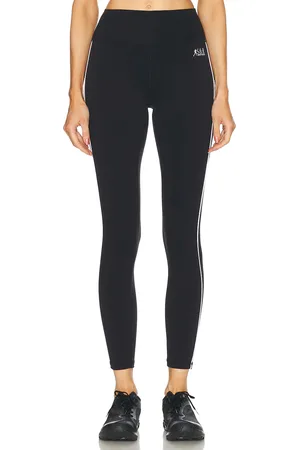Sporty & Rich Runner Legging in Faded Black - Black. Size L (also in S, XS).