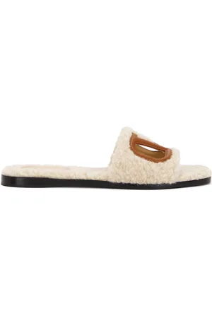 VALENTINO GARAVANI V Logo Cut Out Slide in Naturale & Selleria - Ivory. Size 36.5 (also in 37, 37.5, 38, 38.5, 39, 39.5, 40, 41).