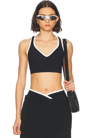 YEAR OF OURS Ribbed V Neck Sports Bra in Black & White - Black. Size M (also in S, XS).