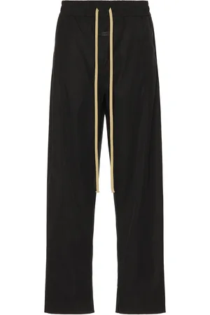 FEAR OF GOD Center Seam Track Pant in Black - Black. Size L (also in M, XL/1X).