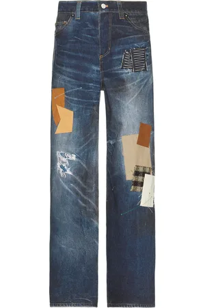 Andersson Bell Unisex Patchwork Printed Denim Trompe L`Oeil Jeans in Blue - Blue. Size 32 (also in 34, 36).