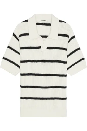 Frame Striped Polo Sweater in Black Stripe - Cream. Size L (also in M, S).
