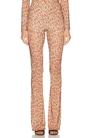 KNWLS Halcyon Legging in Scorched Flower - Orange. Size L (also in M, S, XS).