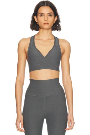 Beyond Yoga Spacedye Lift Your Spirits Bra in True Gray Heather - Grey. Size L (also in M, S, XS).