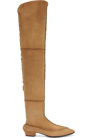 The Row Awar Shearling Boot in Fawn - Brown. Size 36 (also in 36.5, 37, 37.5, 38, 38.5, 39, 39.5, 40).