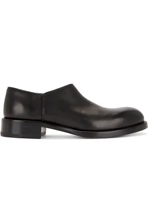 The Row Nobilis Boot in Black - Black. Size 36 (also in 39).