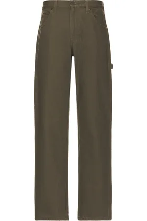 Dickies Relaxed Fit Duck Jean in Rinsed Moss Green - Green. Size 36 (also in ).