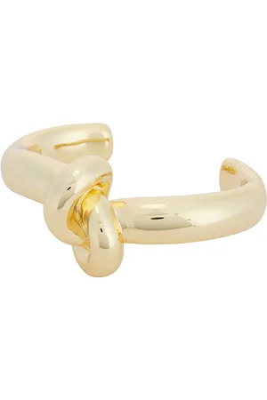 Jennifer Fisher Knot Cuff Bracelet in Yellow Gold - Metallic Gold. Size 1 (also in 2).