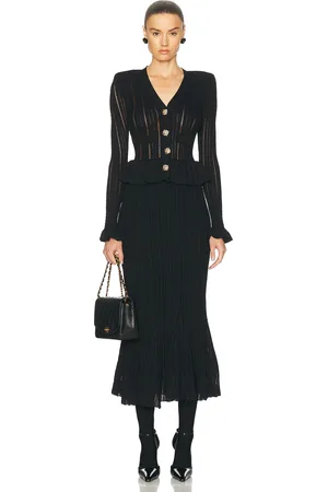 Self-Portrait Knit Peplum Midi Dress in Black - Black. Size S (also in ).