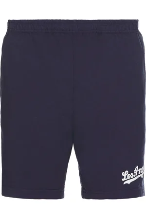 Sporty & Rich Dodgers Gym Short in Dark Navy - Navy. Size L (also in M, S, XL/1X).