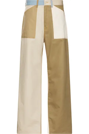 Givenchy Relaxed Fit Patchwork Denim Pants in Multicolor in 960 - Tan. Size 34 (also in 36).