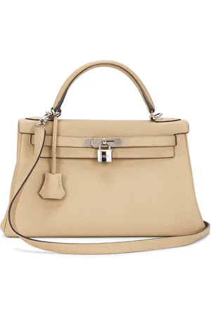 Hermès Togo Kelly 28 Handbag in Trench - Beige. Size all.