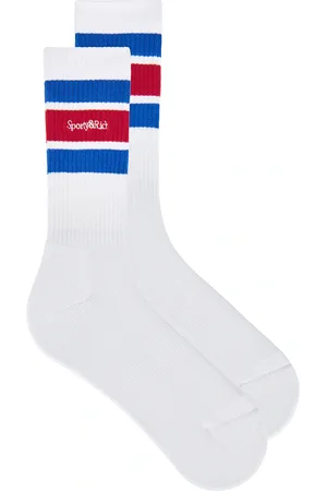 Sporty & Rich Serif Logo Socks in White Paris Blue & Ruby - White. Size all.