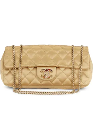 CHANEL Limited Edition Satin East West Flap Bag in Gold - Metallic Gold. Size all.