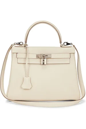 Hermès Togo Kelly 28 Retourne Handbag in Craie - Cream. Size all.