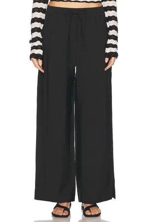 Dagmar Drawstring Pant in Black - Black. Size 32 (also in 34, 36, 38, 40).