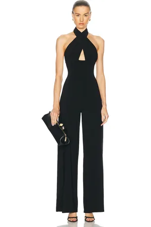 Norma Kamali Cross Halter Straight Leg Jumpsuit in Black - Black. Size L (also in M, S, XL, XS).