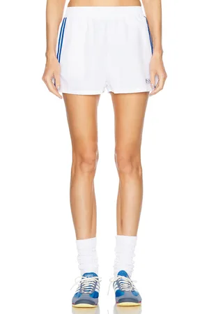 Sporty & Rich Runner Track Short in White - White. Size L (also in M, S, XL, XS).