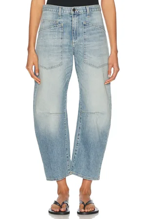 NILI LOTAN Shon Curved Leg in Summer Wash - Blue. Size 25 (also in 26, 27, 28, 29, 30, 31).