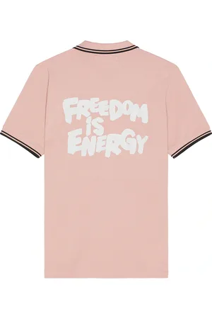 Comme des Garçons X FRED PERRY FREEDOM is ENERGY Polo in Rose - Rose. Size L (also in M, XL).